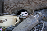 Doll Head in a Basket